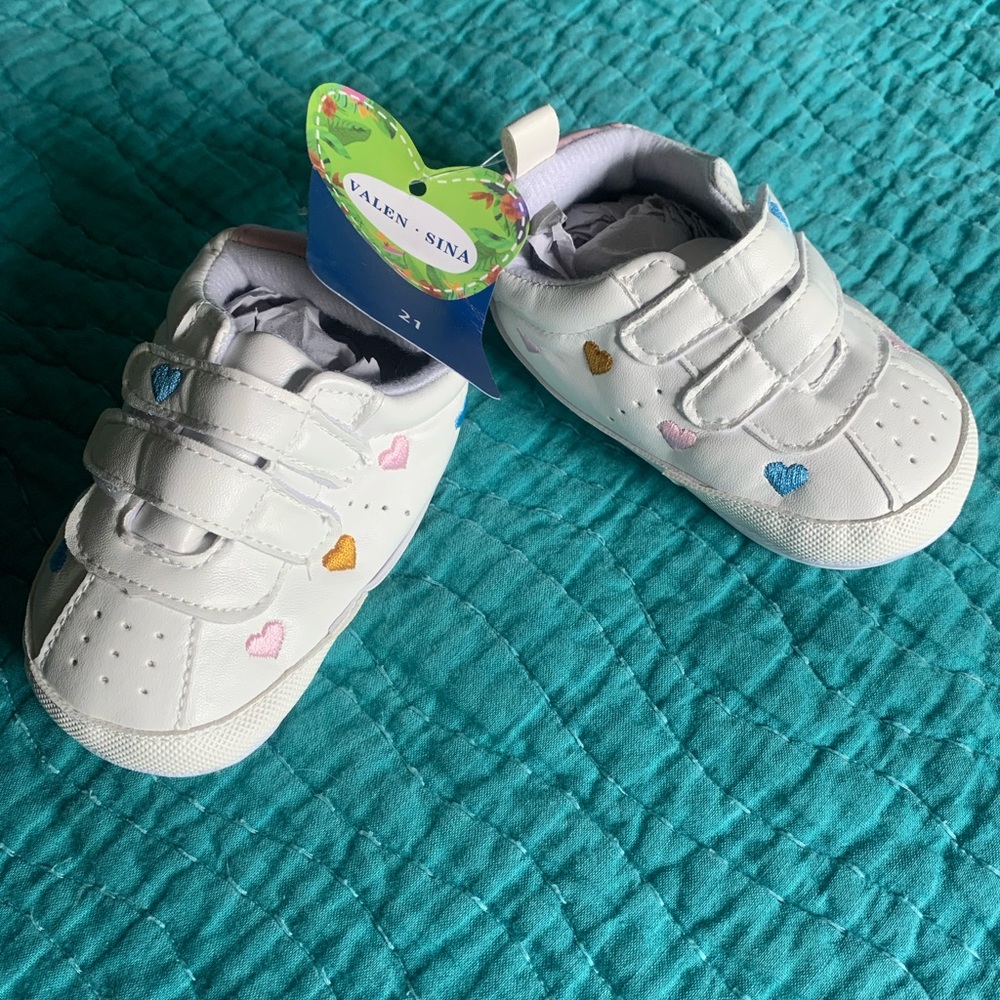 Toddler, tennis shoes. New in bag. Never worn.